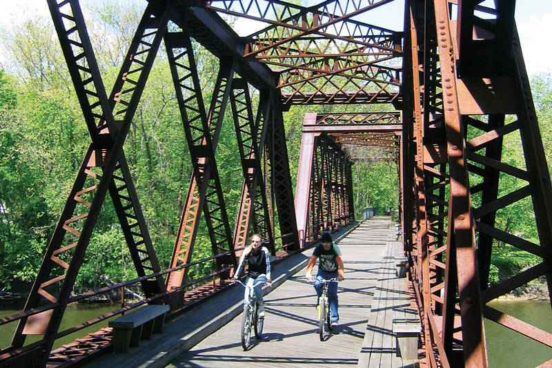 Cyclists crossing a trestle on the Wallkill Valley Rail Trail